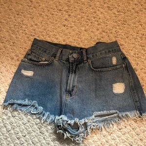 distressed blue denim shorts